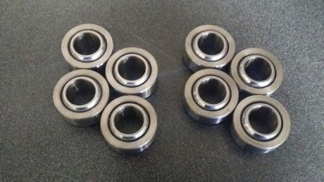 Replacement Shock Bearings for 2013 Models - Replacement shock bearings designed for 2013 model year off-road vehicles, ensuring smooth and reliable suspension performance.